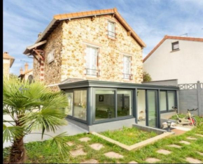 Élégant Appartement Calme et Spacieux avec Jardin